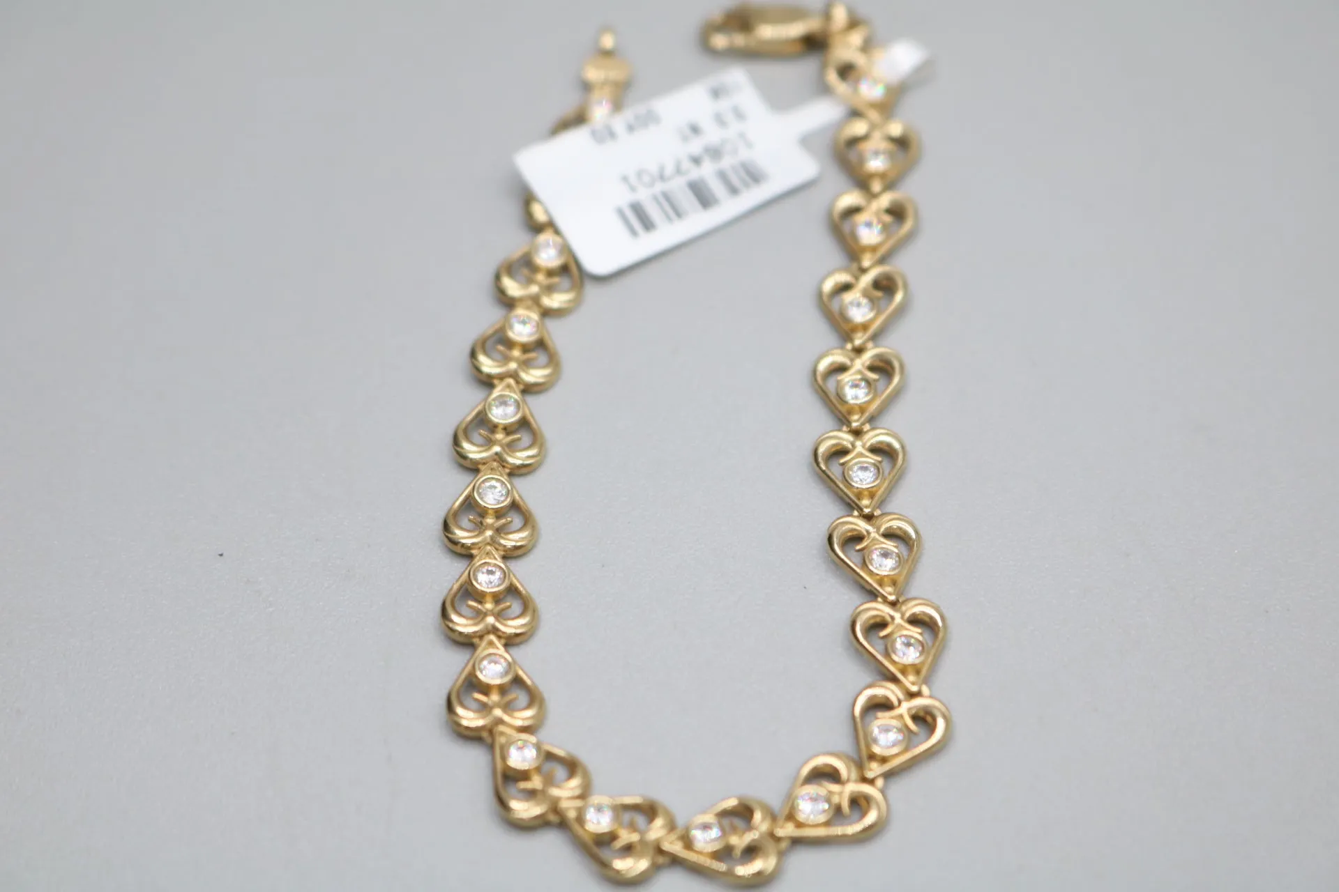 10k Yellow Gold Heart Fancy Lady's Bracelet w/clear stones (Length 7")