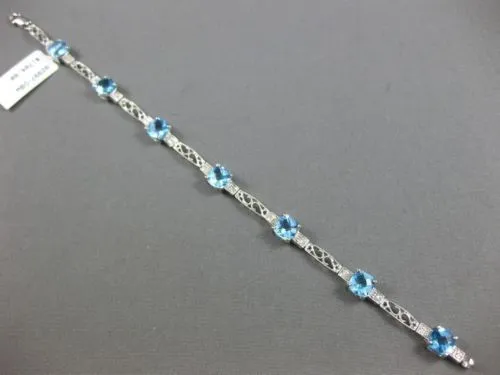 7.71CT DIAMOND & BLUE TOPAZ 14KT WHITE GOLD PAST PRESENT FUTURE TENNIS BRACELET