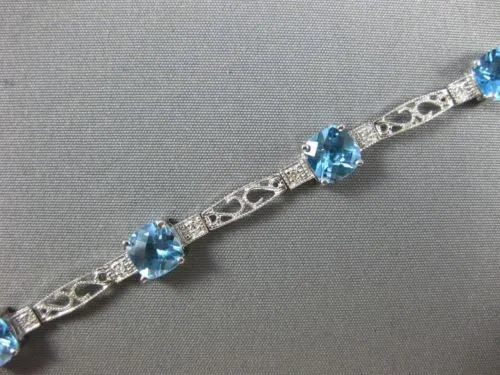 7.71CT DIAMOND & BLUE TOPAZ 14KT WHITE GOLD PAST PRESENT FUTURE TENNIS BRACELET