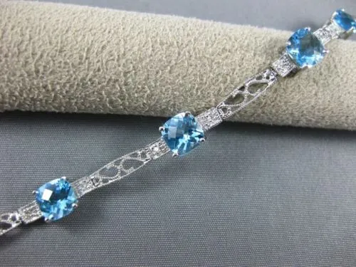 7.71CT DIAMOND & BLUE TOPAZ 14KT WHITE GOLD PAST PRESENT FUTURE TENNIS BRACELET