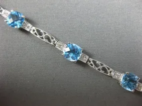 7.71CT DIAMOND & BLUE TOPAZ 14KT WHITE GOLD PAST PRESENT FUTURE TENNIS BRACELET