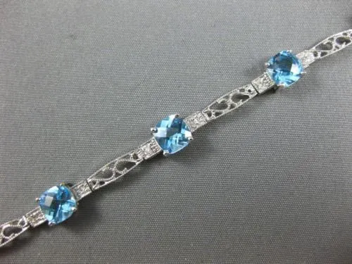 7.71CT DIAMOND & BLUE TOPAZ 14KT WHITE GOLD PAST PRESENT FUTURE TENNIS BRACELET