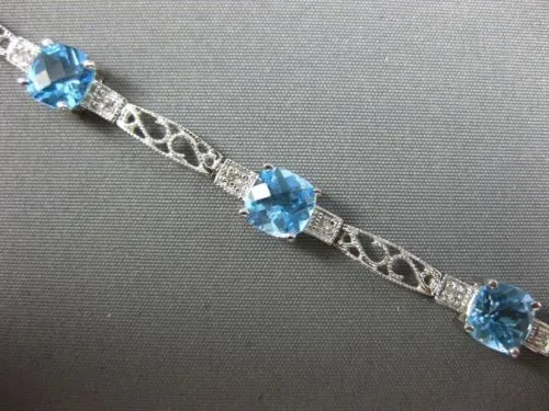 7.71CT DIAMOND & BLUE TOPAZ 14KT WHITE GOLD PAST PRESENT FUTURE TENNIS BRACELET