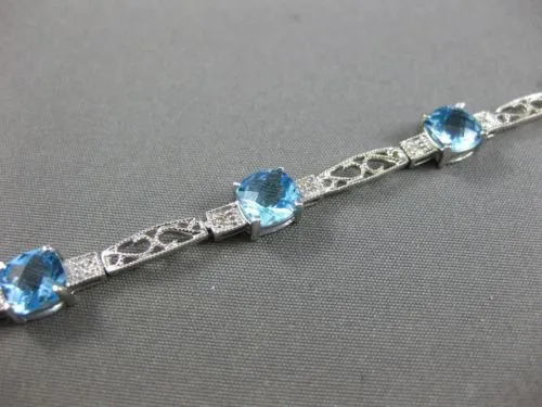 7.71CT DIAMOND & BLUE TOPAZ 14KT WHITE GOLD PAST PRESENT FUTURE TENNIS BRACELET