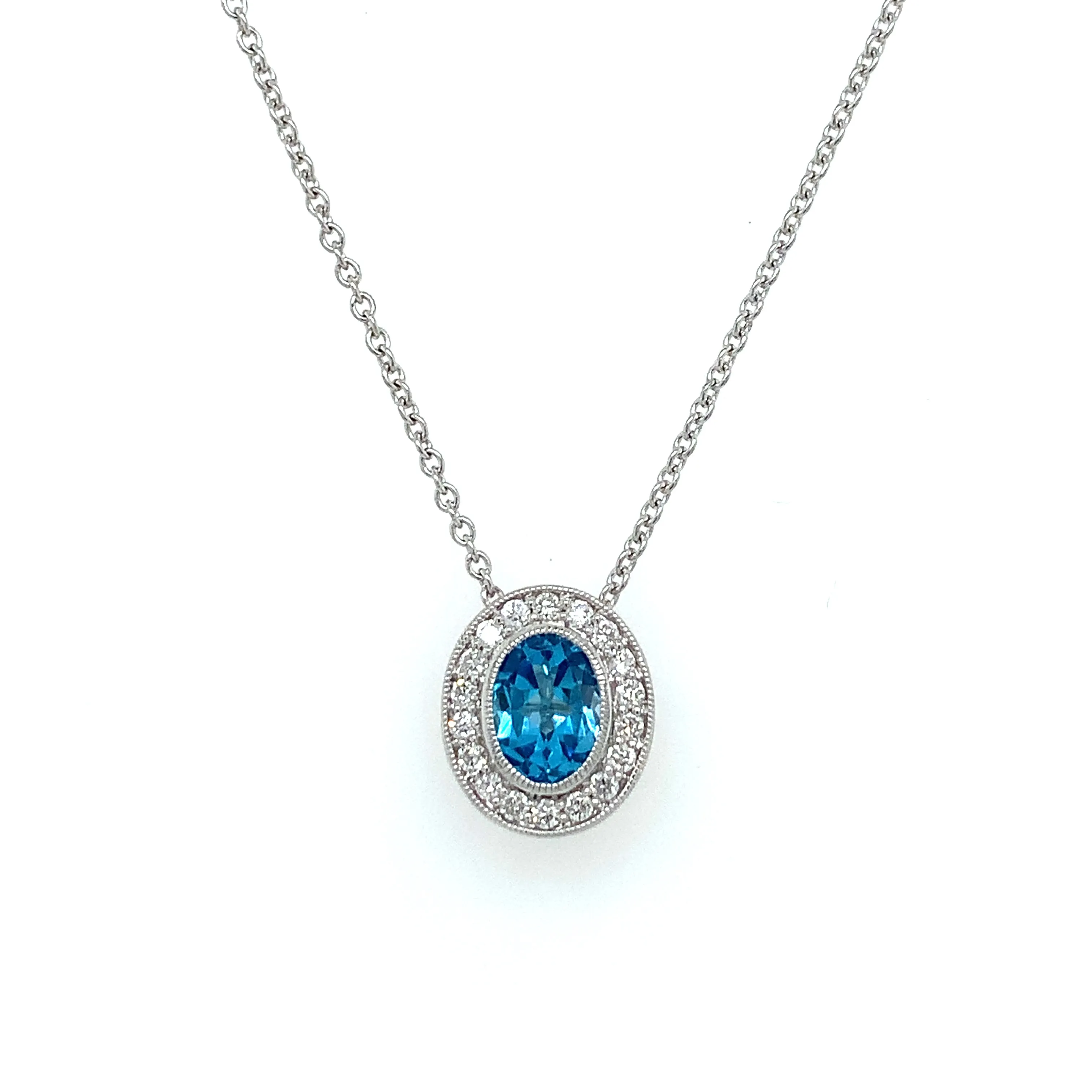 9ct White Gold 0.96ct Blue Topaz & Diamond Halo Pendant