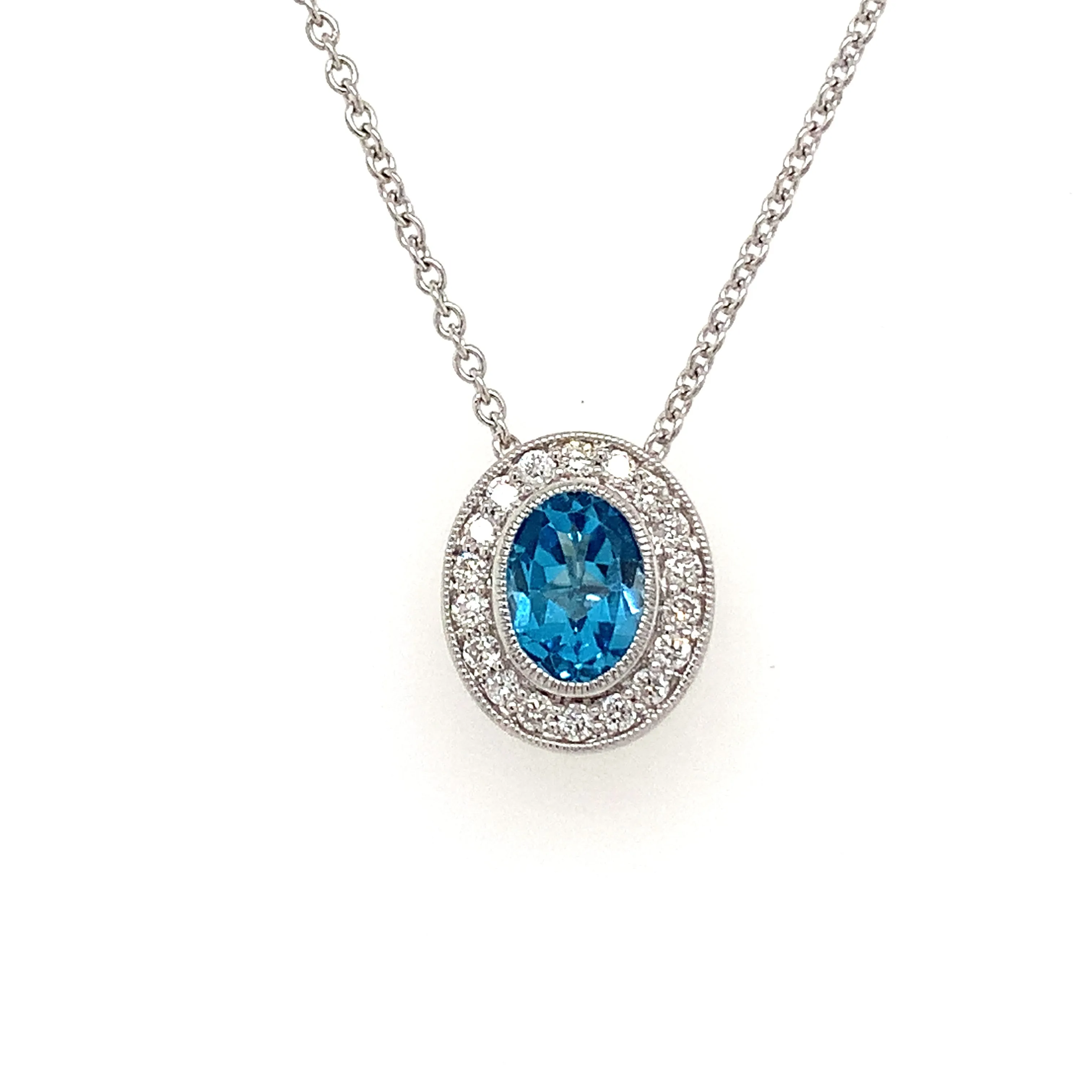 9ct White Gold 0.96ct Blue Topaz & Diamond Halo Pendant