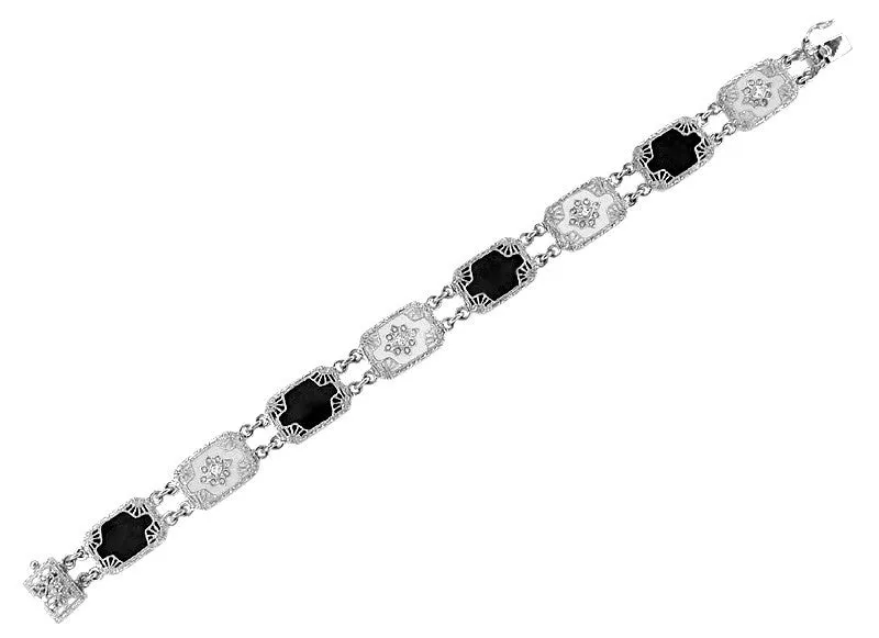 Art Deco Filigree Onyx and Diamond Set Bracelet in 14 Karat White Gold