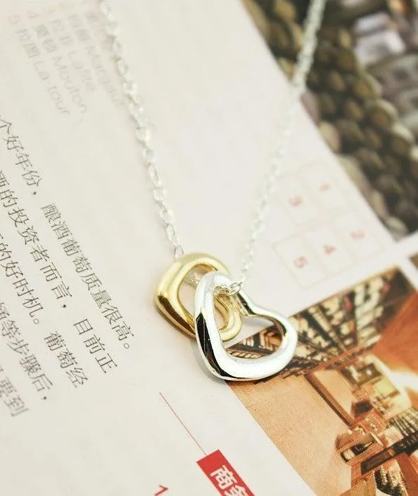 DOUBLE HEART, DOUBLE LOVE NECKLACE