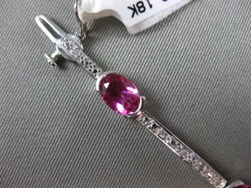 ESTATE 6.46CT DIAMOND & PINK SAPPHIRE 18KT WHITE GOLD SEMI BEZEL TENNIS BRACELET