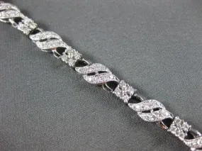 ESTATE WIDE 1.88CT DIAMOND 14KT WHITE GOLD 2 ROW MULTI WAVE TENNIS BRACELET