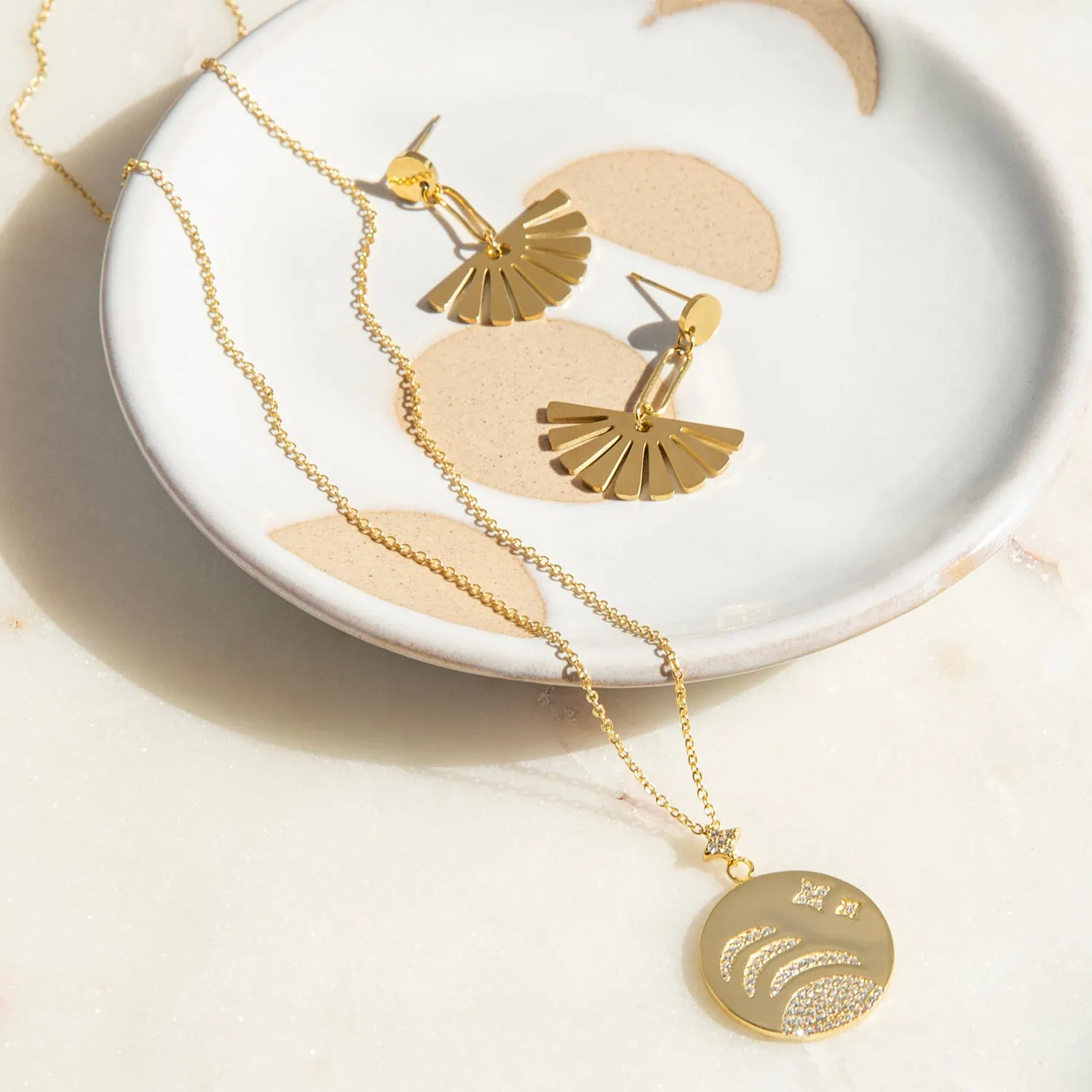 gold plated moon and star disc necklace