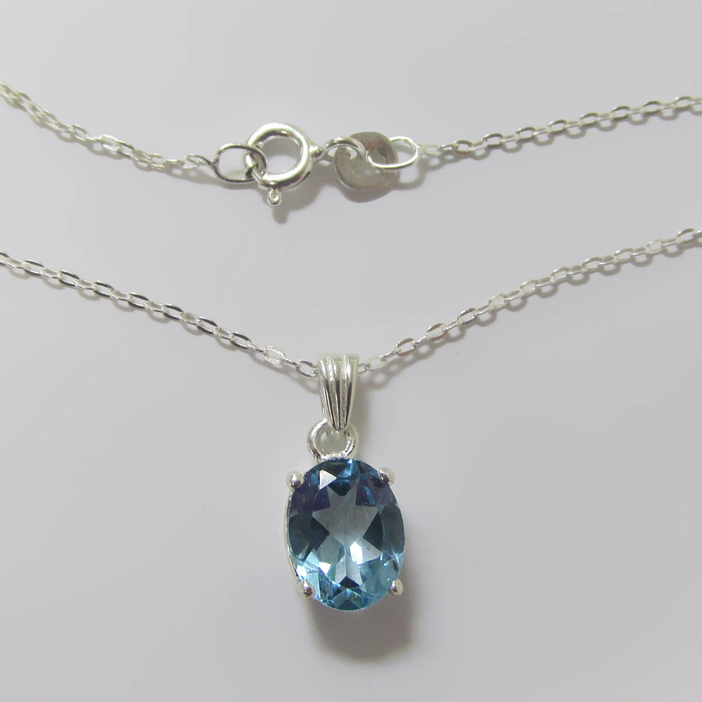 Oval Blue Topaz Pendant Necklace