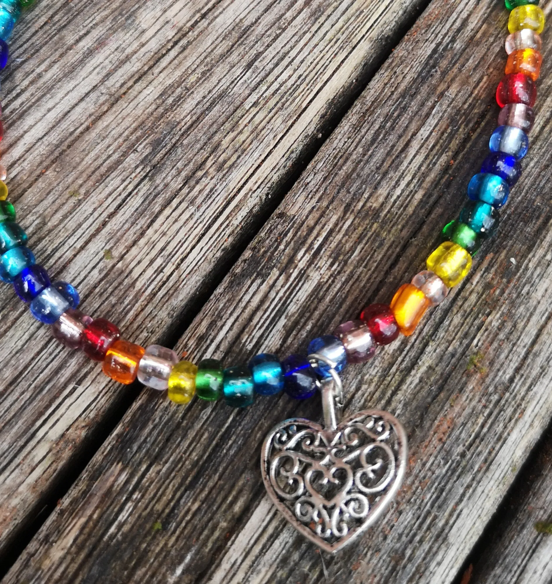 "Love & Pride" simple rainbow LGBT bracelet with heart charm