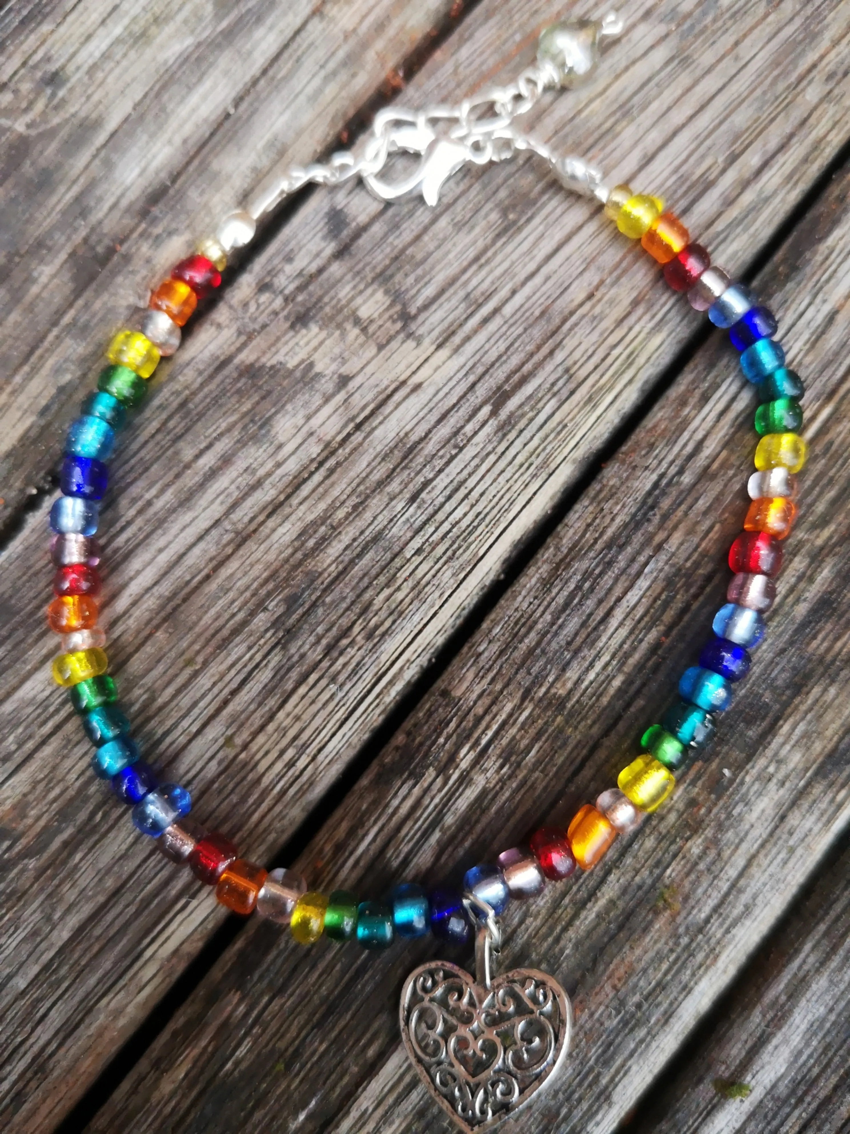 "Love & Pride" simple rainbow LGBT bracelet with heart charm