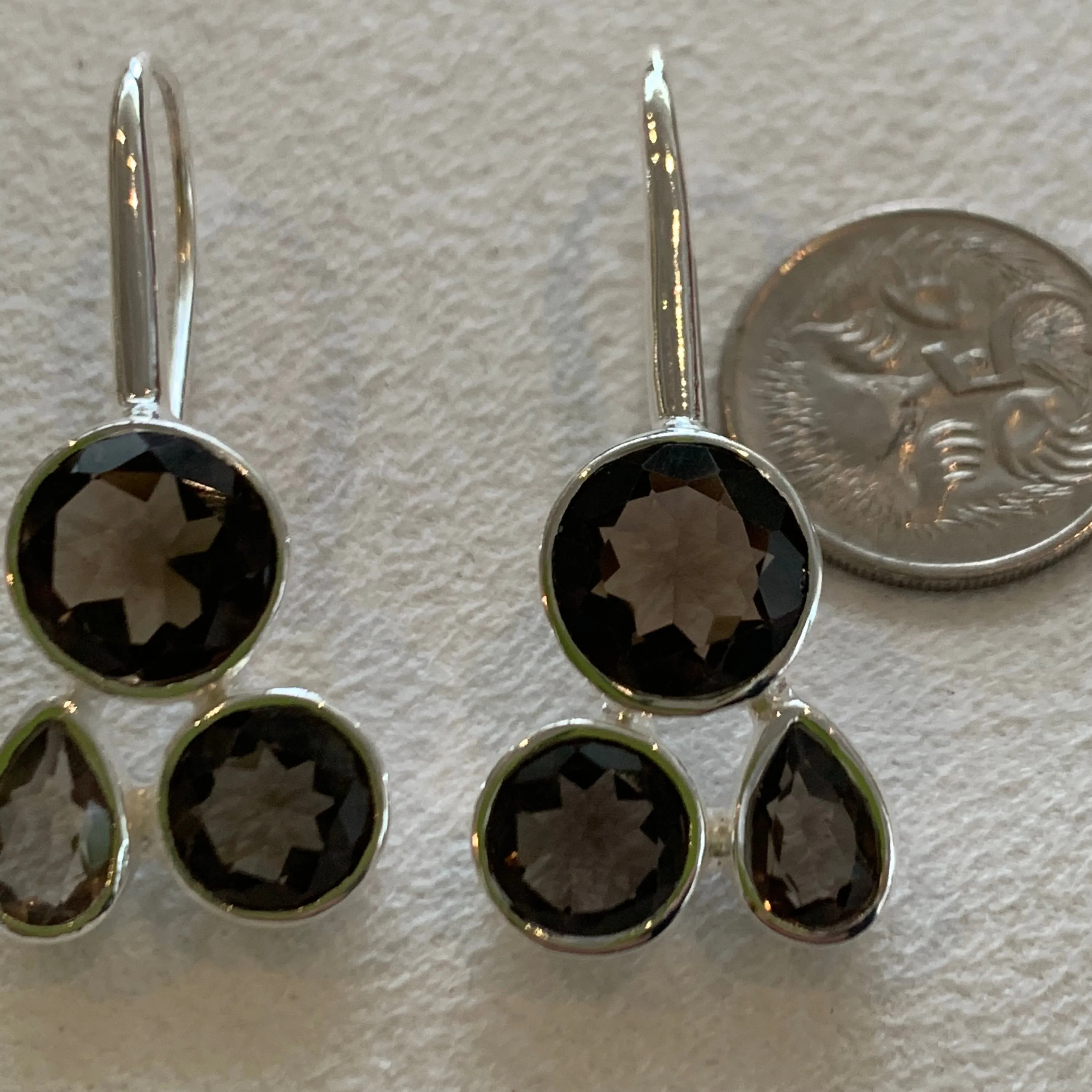 Smoky quartz stones and silver plated earring with three stones