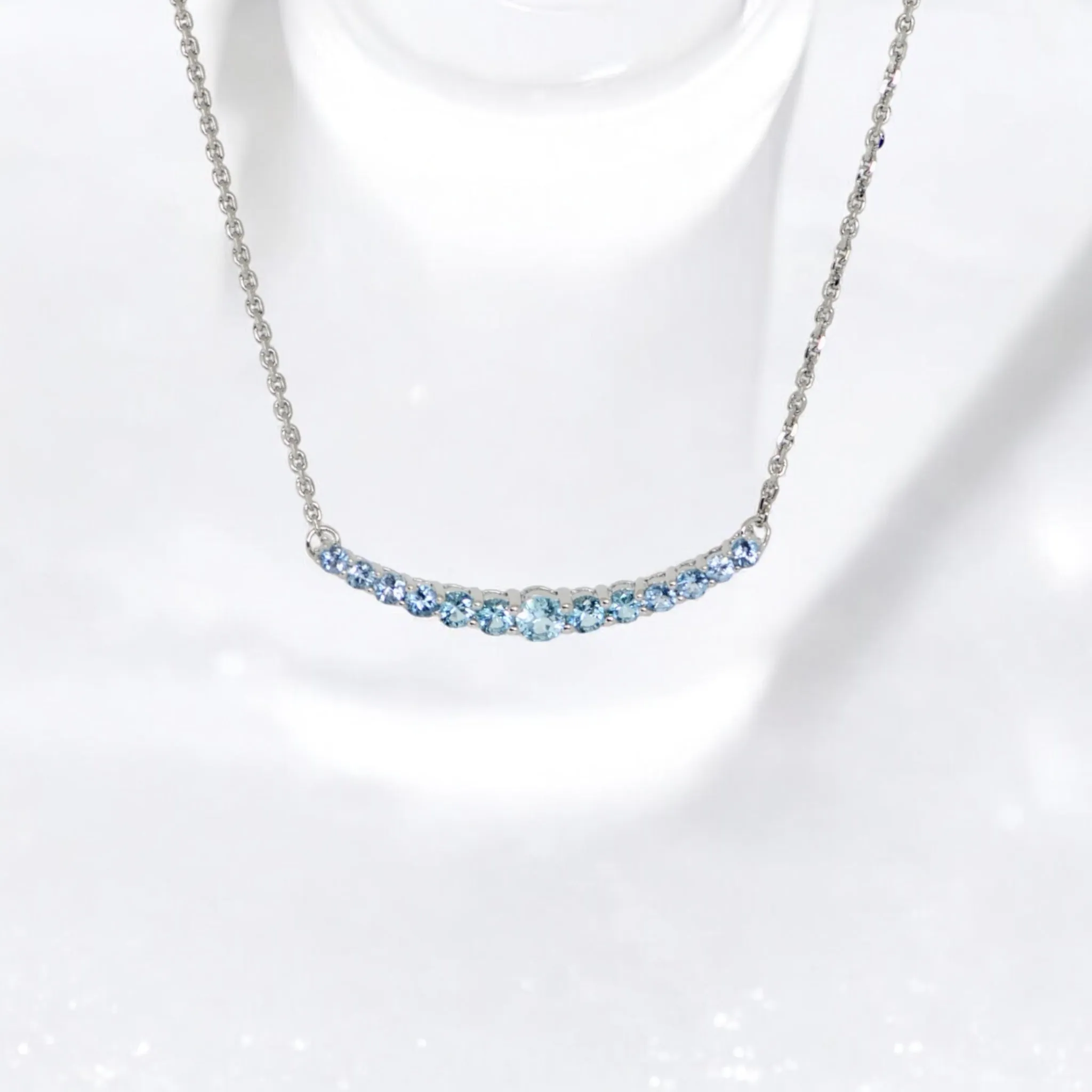 Sterling Silver Swiss Blue Topaz Lined Curved Bar Pendant Necklace